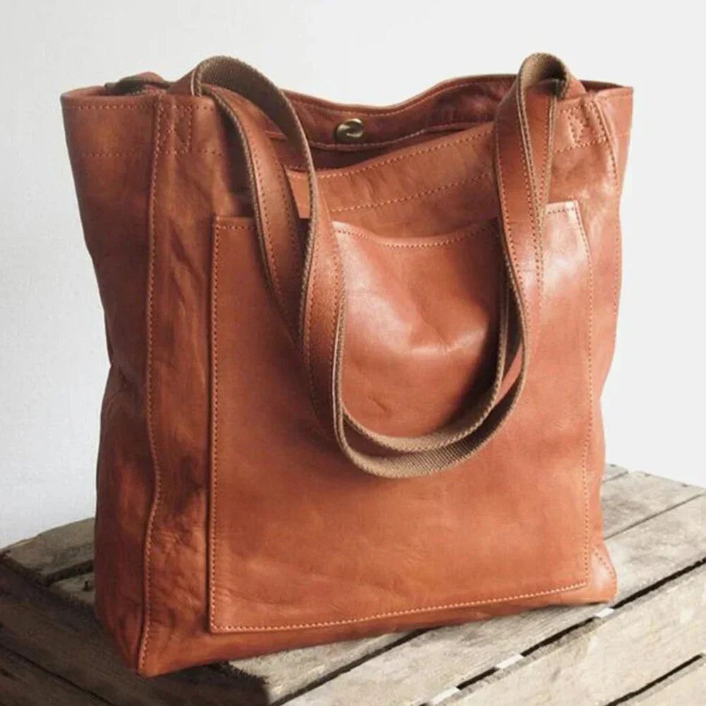 Elegant praktisk läderhandväska