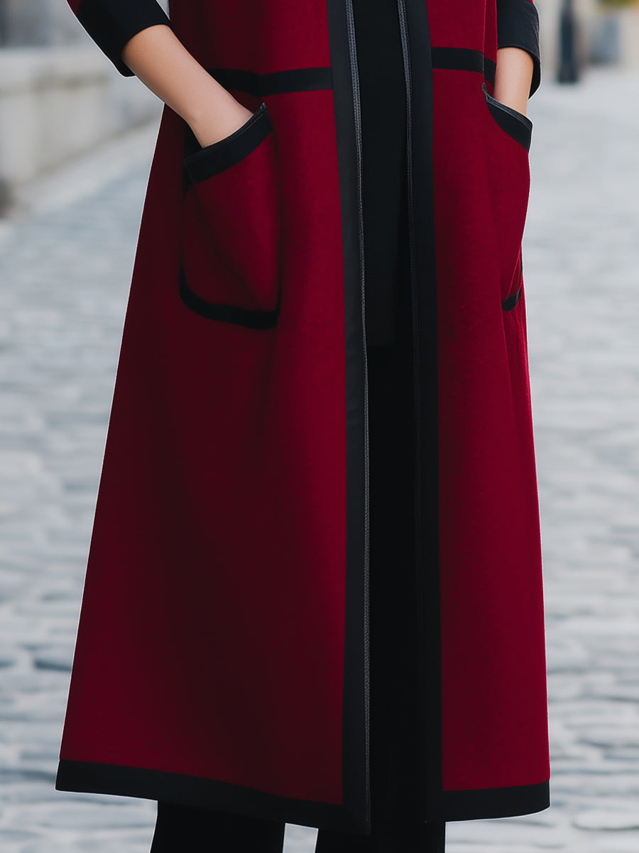 Elegant ullkappa med fickor