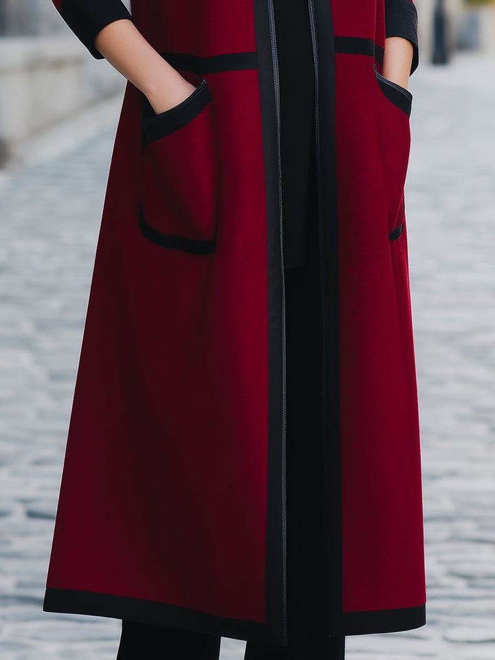 Elegant ullkappa med fickor