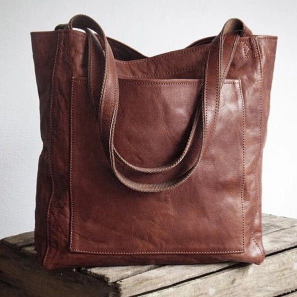 Elegant praktisk läderhandväska